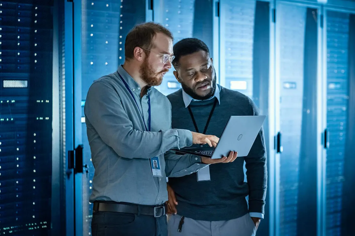 True Blue Tech technicians reviewing a repair on-site